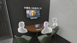 Sala de reuniones «Huddle» de Cisco con tres personas virtuales hablando frente a la pantalla montada en la pared y la barra de vídeo.